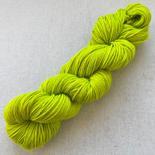 Load image into Gallery viewer, OOAK Variant of Diet Mountain Dew (Trial 2) Hand Dyed Merino Wool Superwash DK Yarn