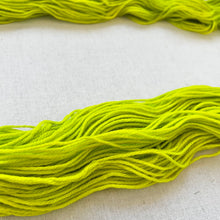 Load image into Gallery viewer, OOAK Variant of Diet Mountain Dew (Trial 2) Hand Dyed Merino Wool Superwash DK Yarn