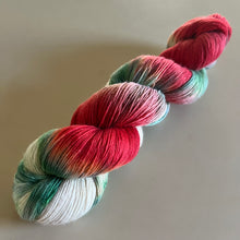 Load image into Gallery viewer, It’s Beginning to Look a Lot Like Christmas Hand Dyed Superwash 100% Fine Organic Merino Wool Sock Yarn
