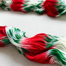 Load image into Gallery viewer, OOAK Variant of It’s Beginning to Look a Lot Like Christmas (Trial 17) Hand Dyed Merino Wool, Cashmere and Nylon Superwash Sock/Fingering Yarn
