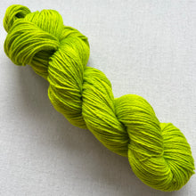 Load image into Gallery viewer, OOAK Variant of Diet Mountain Dew (Trial 3) Hand Dyed Merino Wool Superwash DK Yarn