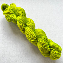 Load image into Gallery viewer, OOAK Variant of Diet Mountain Dew (Trial 6) Hand Dyed Merino Wool Extra Soft Superwash DK Yarn