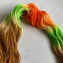 Load image into Gallery viewer, OOAK Variant of 24Carrot Magic (Trial 2) - Hand Dyed Superwash 100% Bluefaced Leicester Sock Yarn