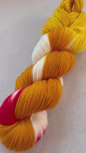Load and play video in Gallery viewer, Upside Down Hand Dyed Merino Wool Superwash Sport Yarn