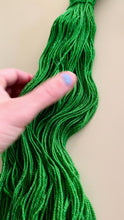 Load and play video in Gallery viewer, Mele Kalikimaka Hand Dyed Superwash Merino Wool & Nylon Sparkle Sock Yarn