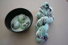 Load image into Gallery viewer, Melting (Mint Chocolate Chip Ice Cream) Hand Dyed Superwash 100% Merino Wool DK Yarn