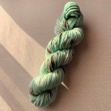 Load image into Gallery viewer, Melting (Mint Chocolate Chip Ice Cream) Hand Dyed Non-Superwash Merino & Camel Aran Yarn