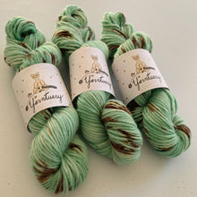 Load image into Gallery viewer, Melting (Mint Chocolate Chip Ice Cream) Hand Dyed Non-Superwash Merino & Camel Aran Yarn