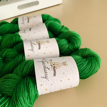 Load image into Gallery viewer, Mele Kalikimaka Hand Dyed Superwash 100% Merino Wool Sport Yarn
