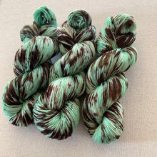 Load image into Gallery viewer, Melting (Mint Chocolate Chip Ice Cream) - Extra Chocolate Version - Hand Dyed Superwash Merino Wool & Nylon Sock Yarn