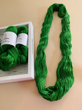 Load image into Gallery viewer, Mele Kalikimaka Hand Dyed Superwash 100% Merino Wool Sport Yarn