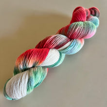 Load image into Gallery viewer, It’s Beginning to Look a Lot Like Christmas Hand Dyed Superwash 100% Fine Organic Merino Wool Sock Yarn
