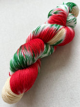 Load image into Gallery viewer, OOAK Variant of It’s Beginning to Look a Lot Like Christmas (Trial 17) Hand Dyed Merino Wool, Cashmere and Nylon Superwash Sock/Fingering Yarn
