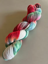 Load image into Gallery viewer, It’s Beginning to Look a Lot Like Christmas Hand Dyed Superwash 100% Fine Organic Merino Wool Sock Yarn
