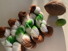 Load image into Gallery viewer, Coconut Hand Dyed Superwash Merino Wool, Cashmere &amp; Nylon Sock Yarn
