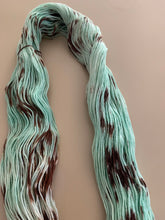 Load image into Gallery viewer, Melting (Mint Chocolate Chip Ice Cream) Hand Dyed Superwash 100% Merino Wool Sport Yarn
