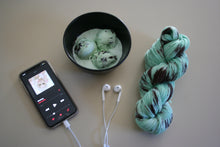 Load image into Gallery viewer, Melting (Mint Chocolate Chip Ice Cream) Hand Dyed Superwash Merino Wool &amp; Nylon Sock Yarn
