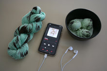 Load image into Gallery viewer, Melting (Mint Chocolate Chip Ice Cream) Hand Dyed Superwash Merino Wool &amp; Nylon Sock Yarn
