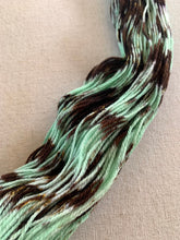 Load image into Gallery viewer, Melting (Mint Chocolate Chip Ice Cream) - Extra Chocolate Version - Hand Dyed Superwash Merino Wool &amp; Nylon Sock Yarn
