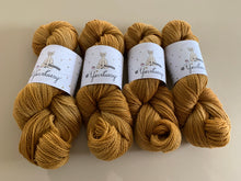 Load image into Gallery viewer, Peanut Butter Conspiracy Hand Dyed Superwash 100% Merino Wool Sock Yarn
