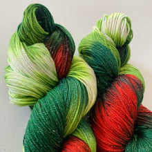 Load image into Gallery viewer, Mistletoe and Holly Hand Dyed Sparkly Superwash Merino Wool &amp; Nylon Sock Yarn
