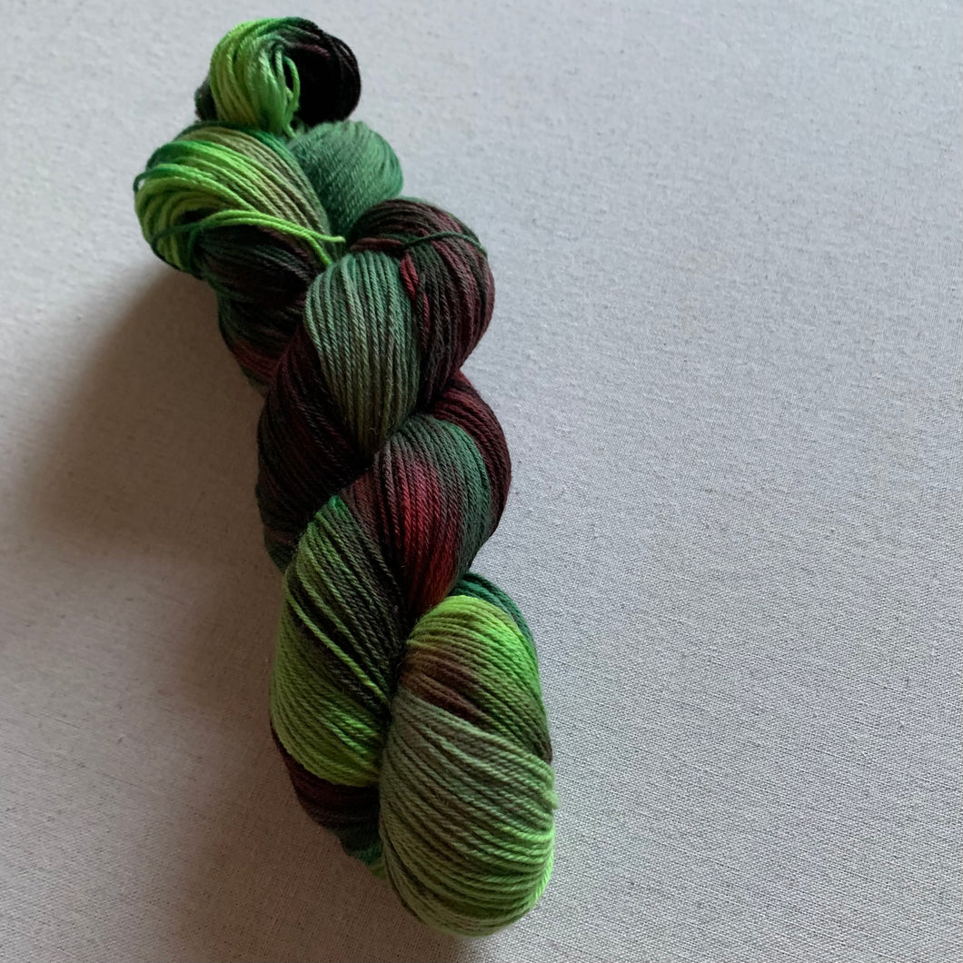 OOAK Variant of Mistletoe and Holly Hand Dyed Organic Merino Wool & Biodegradable Nylon Sock Yarn