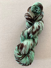 Load image into Gallery viewer, Melting (Mint Chocolate Chip Ice Cream) - Extra Chocolate Version - Hand Dyed Superwash Merino Wool &amp; Nylon Sock Yarn
